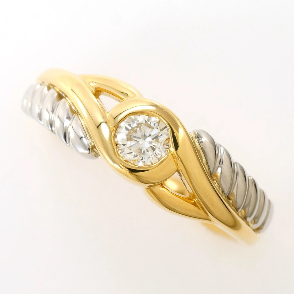 Platinum (PT) and yellow gold (YG) ring with a 0.20ct diamond, total weight 3...